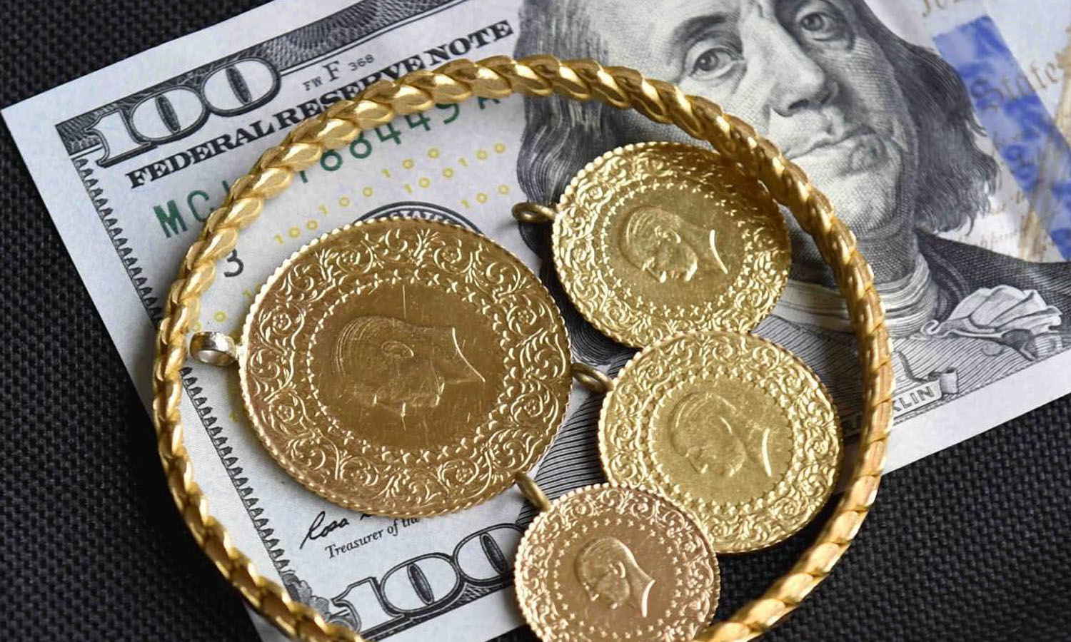 Altın kar satışıyla düştü, ancak rekor tazeleme eğilimini koruyor